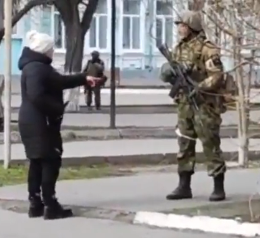 Ukrainian woman telling Russian soldier to carry sunflower seeds so flowers will sprout when he dies on Ukrainian soil
