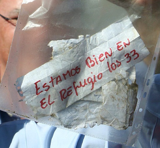 the first note from the 33 trapped miners, proving they were alive: Estamos bien en el refugio, los 33