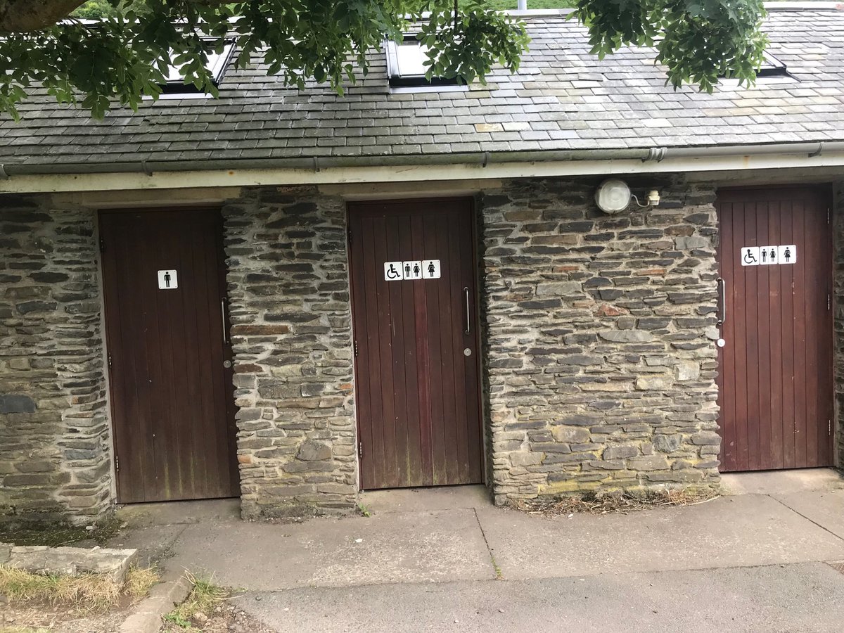 public restrooms at Exmoor National Park labelled one for men, the other for everyone