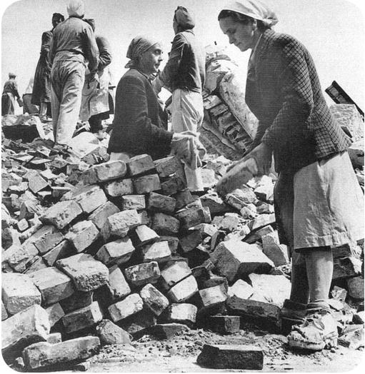 women rebuilding Berlin, brick by brick, after enduring bombing for years